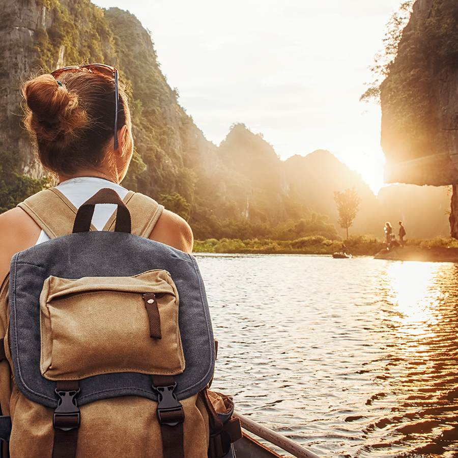 A woman near the mountain river