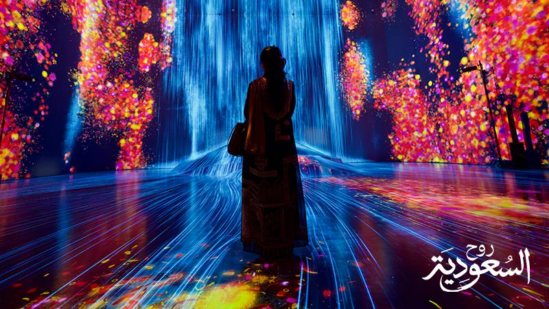 Saudi woman watching a stunning light show