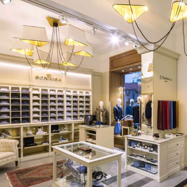 Gian Carlo's beautiful interior with classic men's suits and accessories
