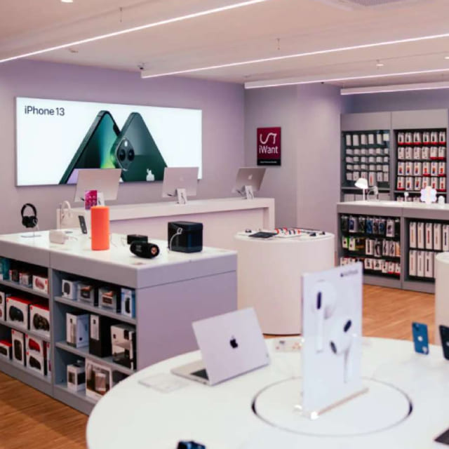 Interior of the iWant shop in Brno with a variety of Apple products